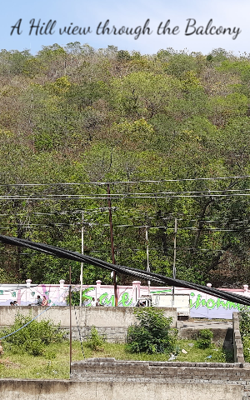 A Hill View Through The Balcony