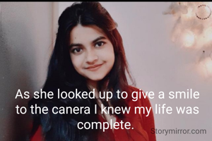 As she looked up to give a smile to the canera I knew my life was complete. 